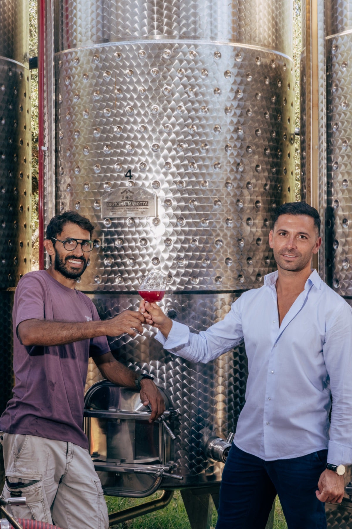 The Paride D’Angelo team sharing a glass in the cellar
